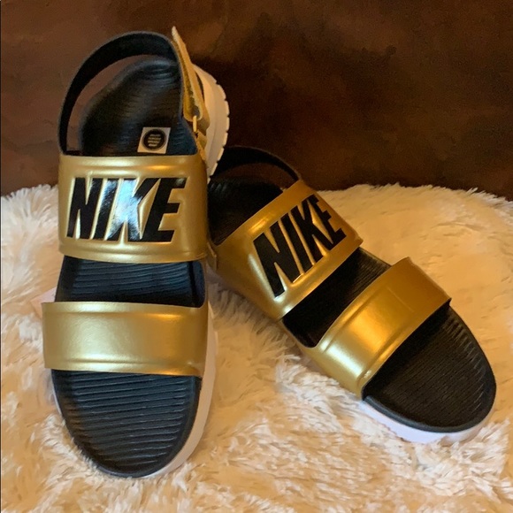 gold nike tanjun sandals